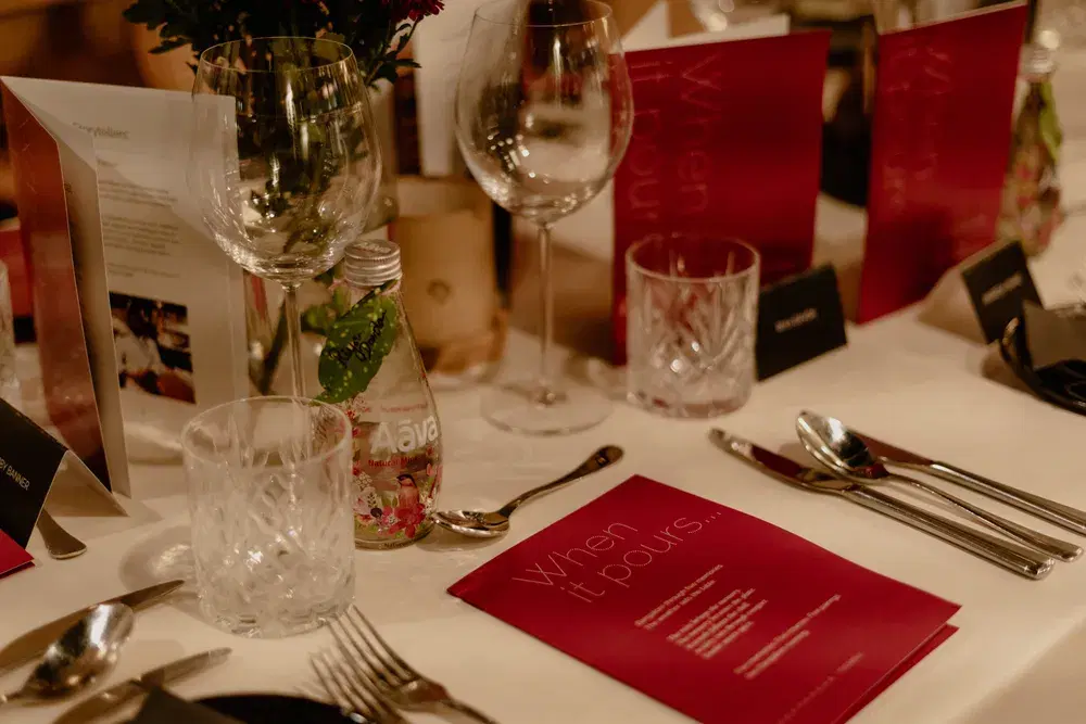 A dinner table laid for a Postcard culinary pop-up
